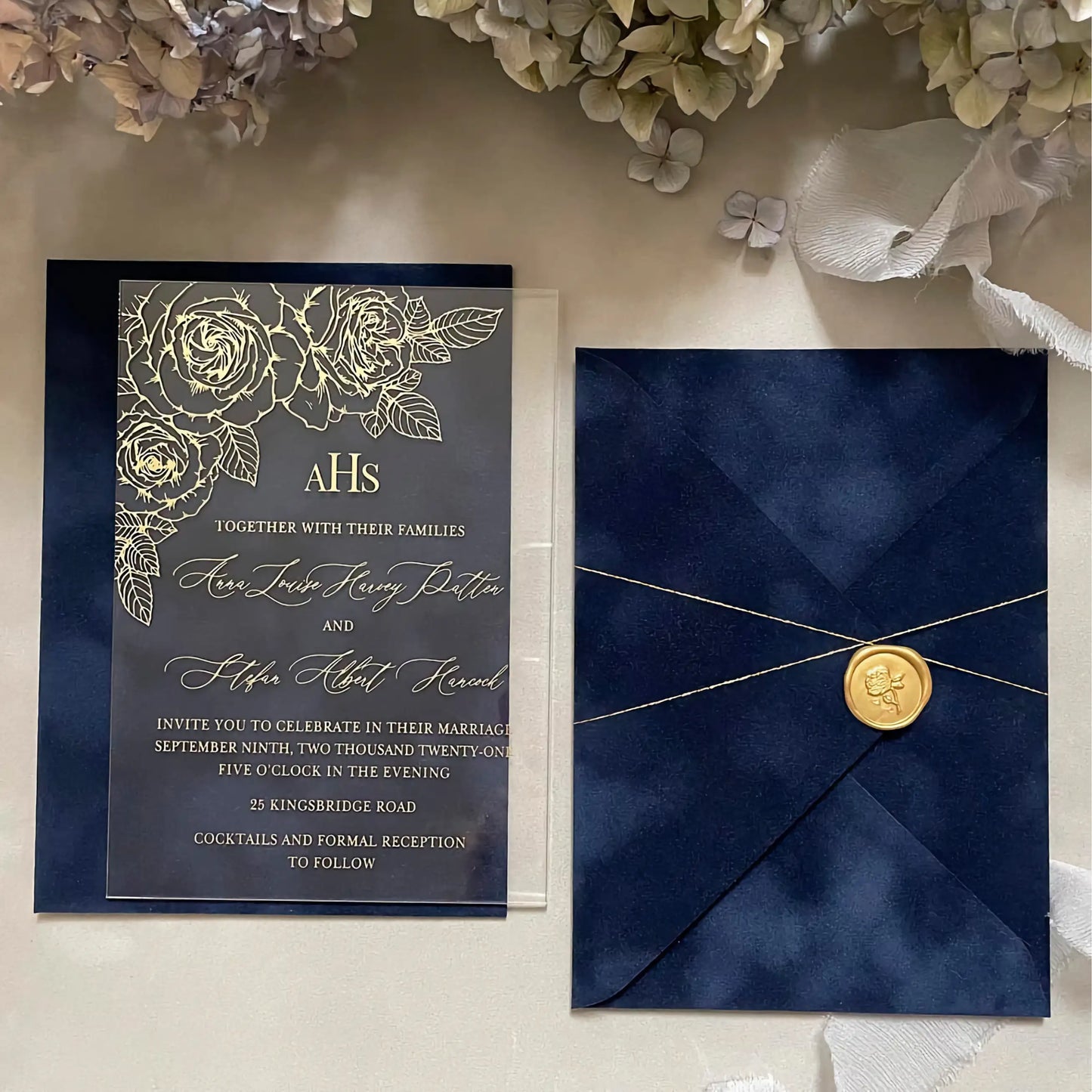 Gold Roses Acrylic wedding invitation with gold foil roses and Navy Blue velvet envelope with gold wax seal styled flat lay — Polina Perri