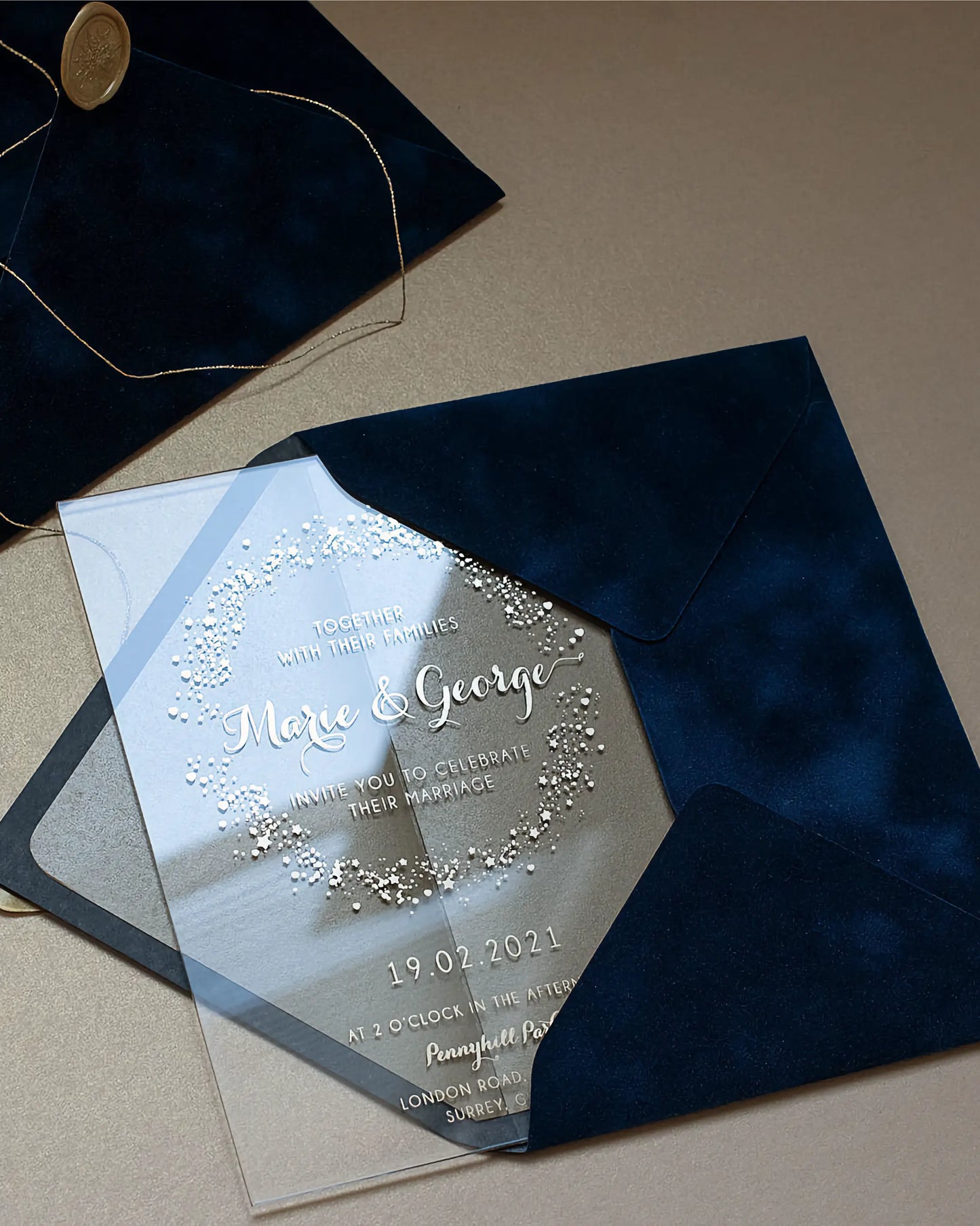 Magic Dust Acrylic wedding invitation with white foil dust pattern on Navy Blue velvet envelope flat lay — Polina Perri