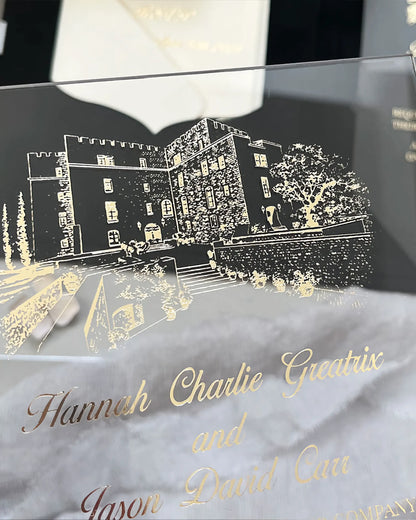 Black Velvet Venue Folio close-up with gold foil venue illustration and script names on acrylic insert — Polina Perri