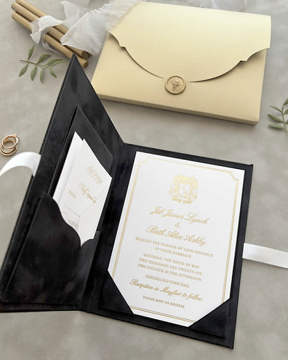 Black Velvet Venue Folio open showing cream invitation card with gold crest and cream envelope — Polina Perri