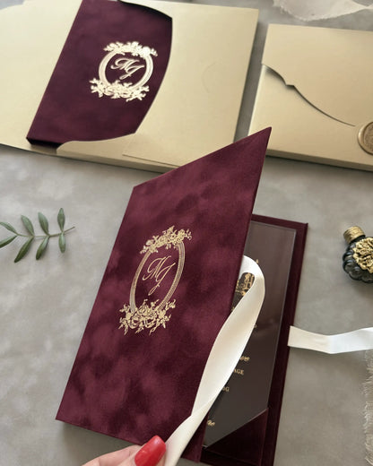 Regina Burgundy velvet folio cover with gold foil monogram crest close-up — Polina Perri