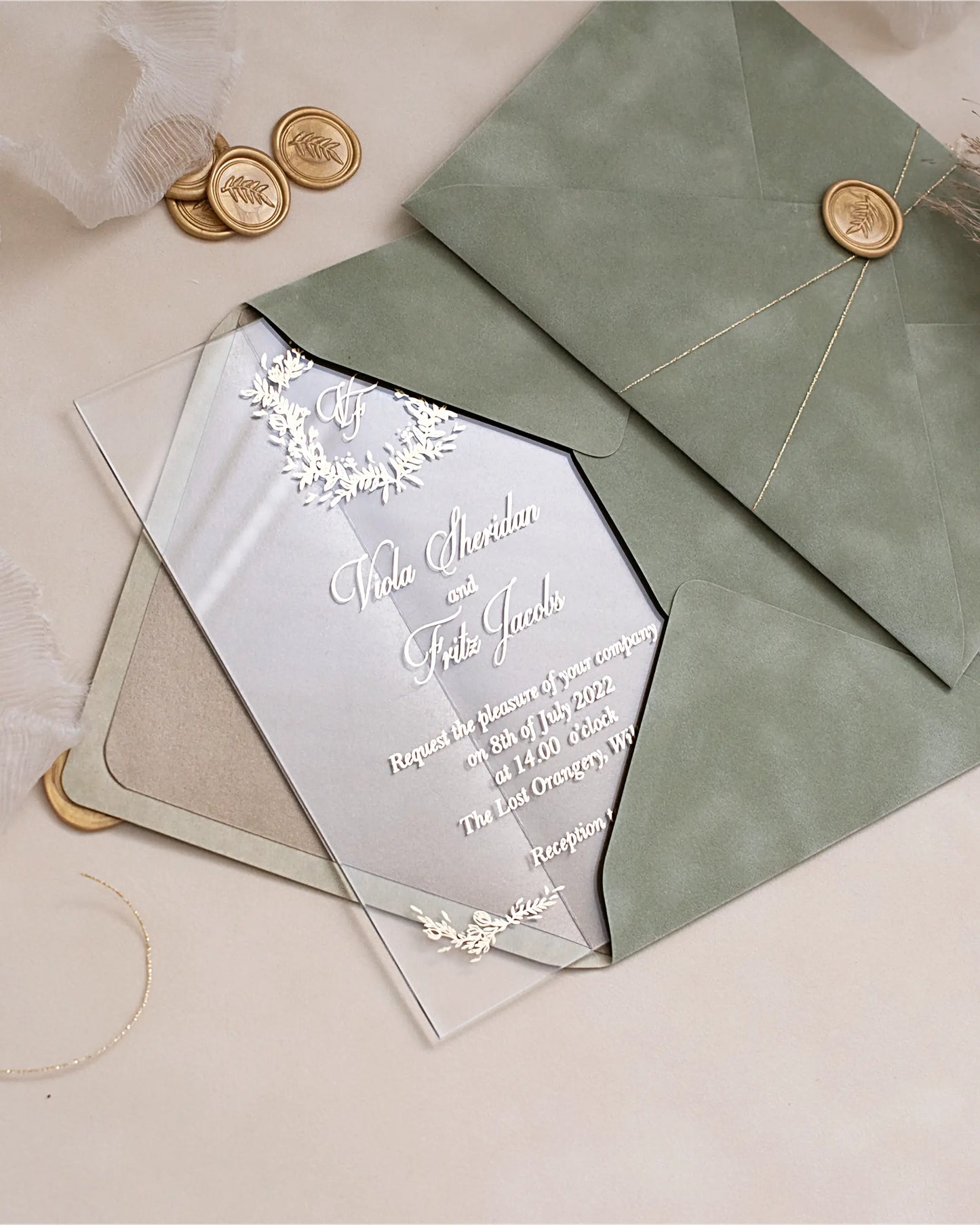 Fiori Acrylic Wedding Invitation on Sage Green velvet envelope with gold wax seals — Polina Perri