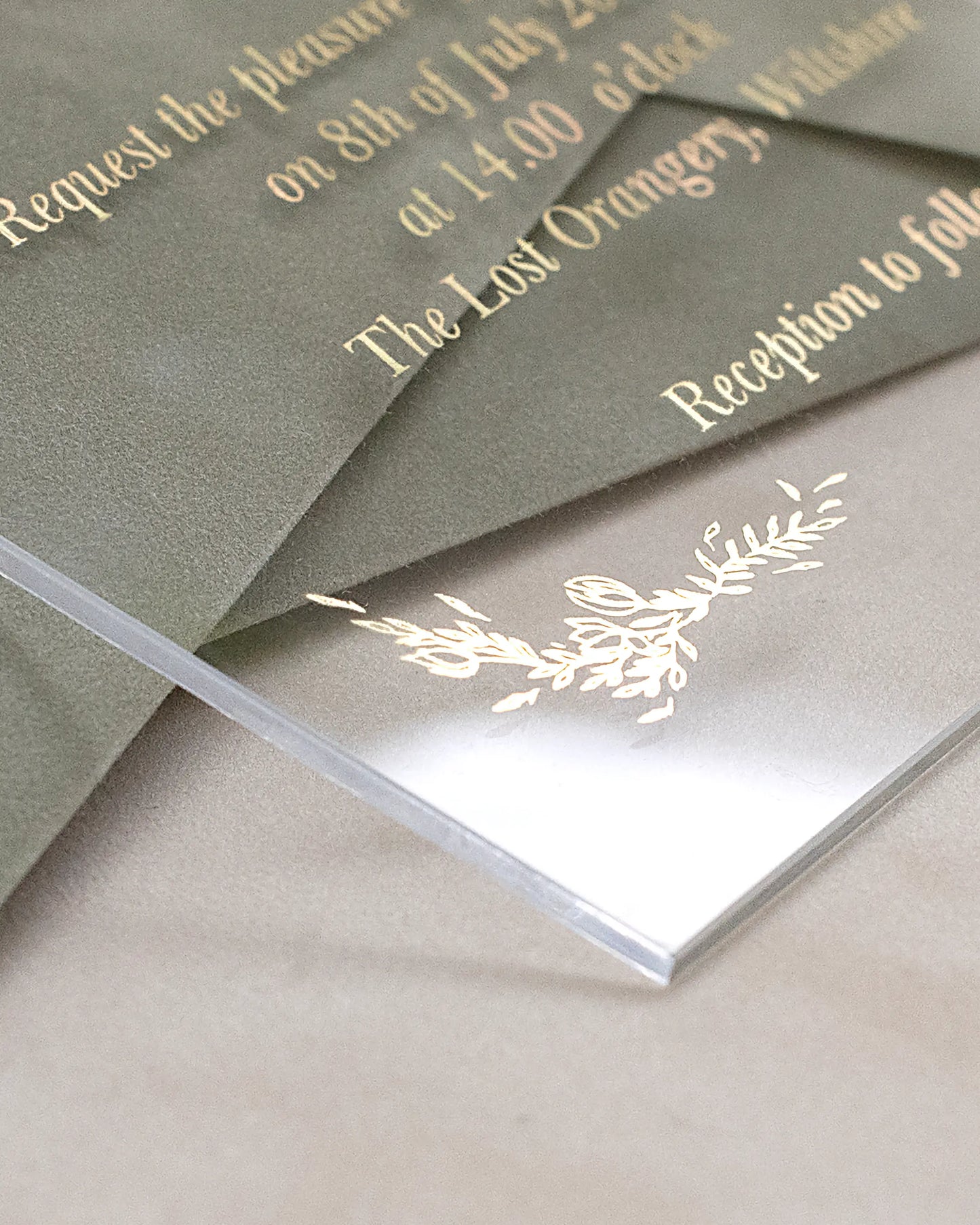Fiori Acrylic Wedding Invitation edge detail with white foil botanical motif on Sage Green velvet envelope — Polina Perri