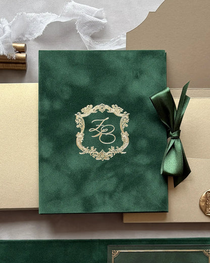 Buckingham Forest Green Velvet Folio close-up with gold foil baroque monogram crest and green velvet ribbon — Polina Perri