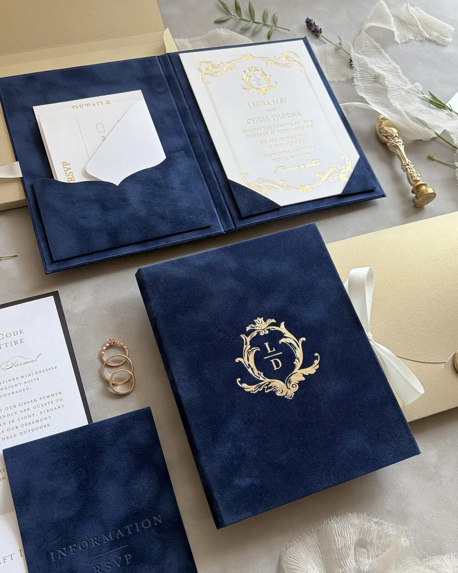 Isabelle Navy Blue velvet folio wedding invitation suite with gold monogram crest and insert suite — Polina Perri