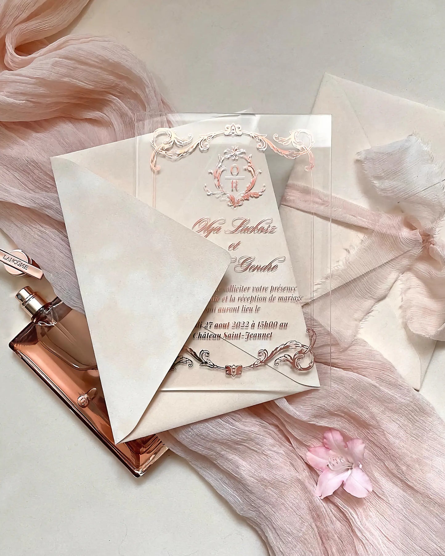 Isabelle Rose Gold Acrylic Wedding Invitation with Blush envelope and perfume on pink silk fabric — Polina Perri