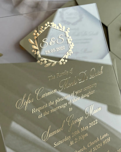 Eucalyptus Minimalist Acrylic wedding invitation close-up with gold foil botanical monogram and script lettering — Polina Perri
