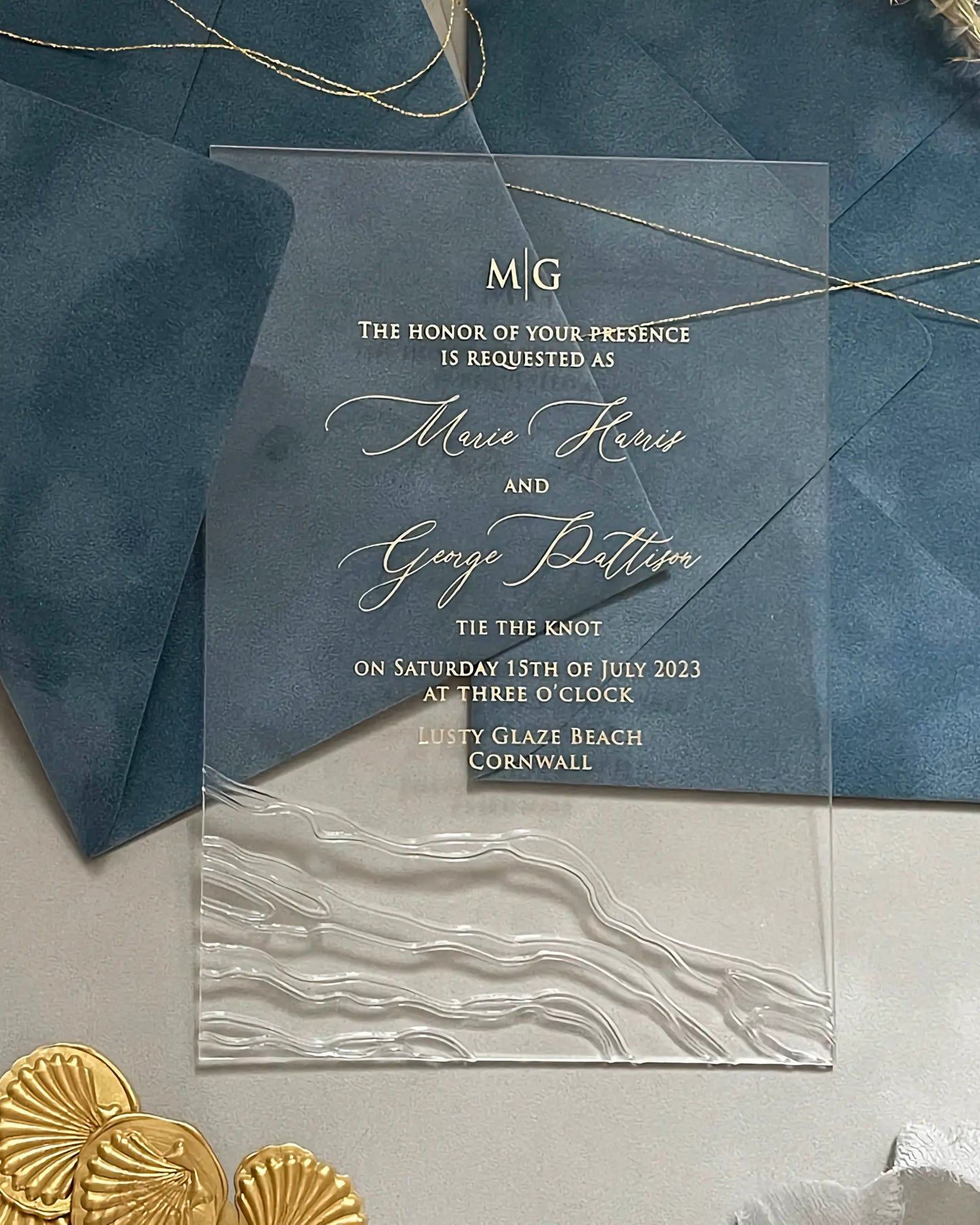 Seawaves Acrylic Wedding Invitation on Dusty Blue velvet envelope with embossed wave detail — Polina Perri