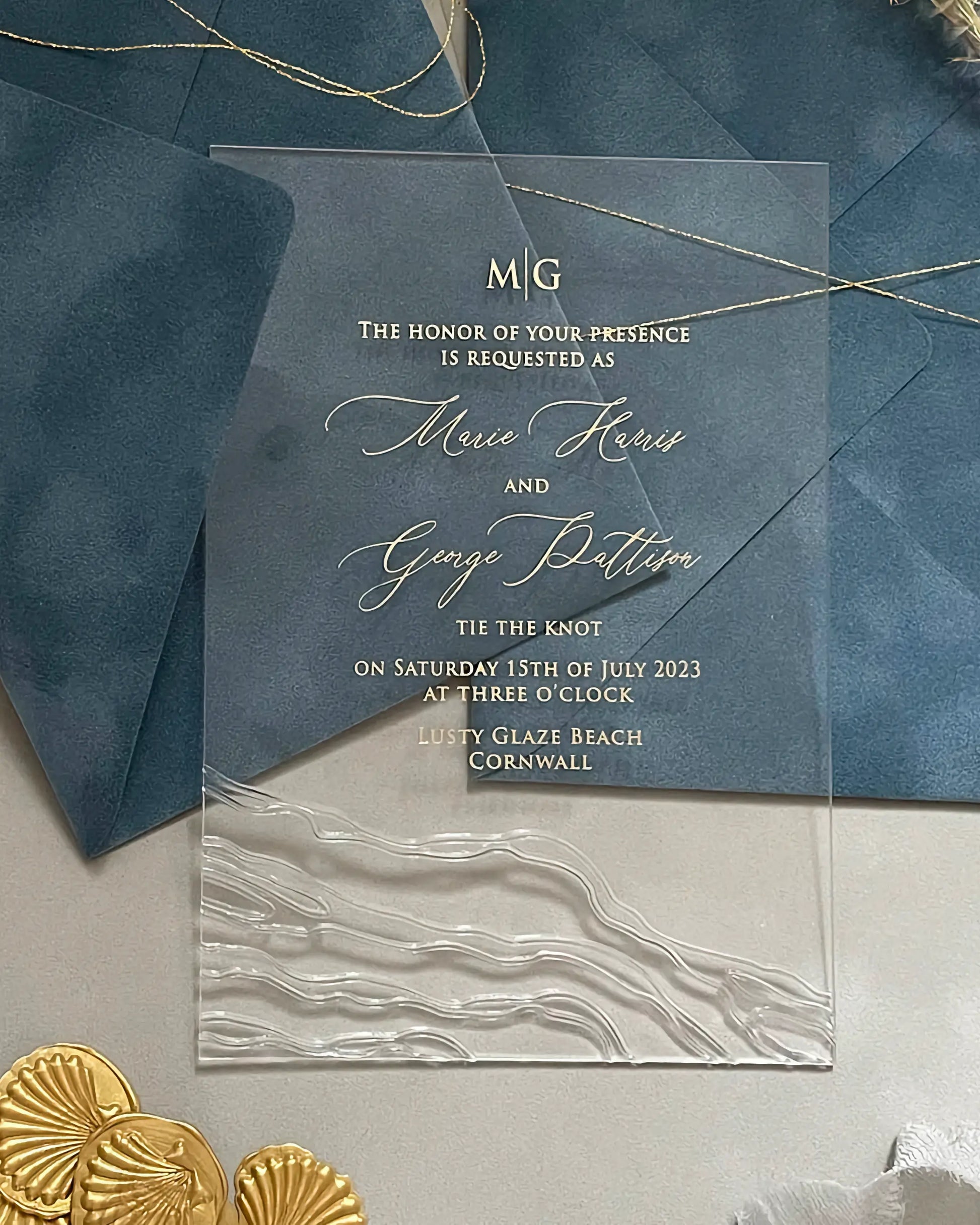 Seawaves Acrylic Wedding Invitation on Dusty Blue velvet envelope with embossed wave detail — Polina Perri