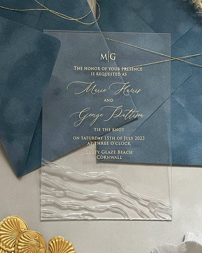Seawaves Acrylic Wedding Invitation on Dusty Blue velvet envelope with embossed wave detail — Polina Perri