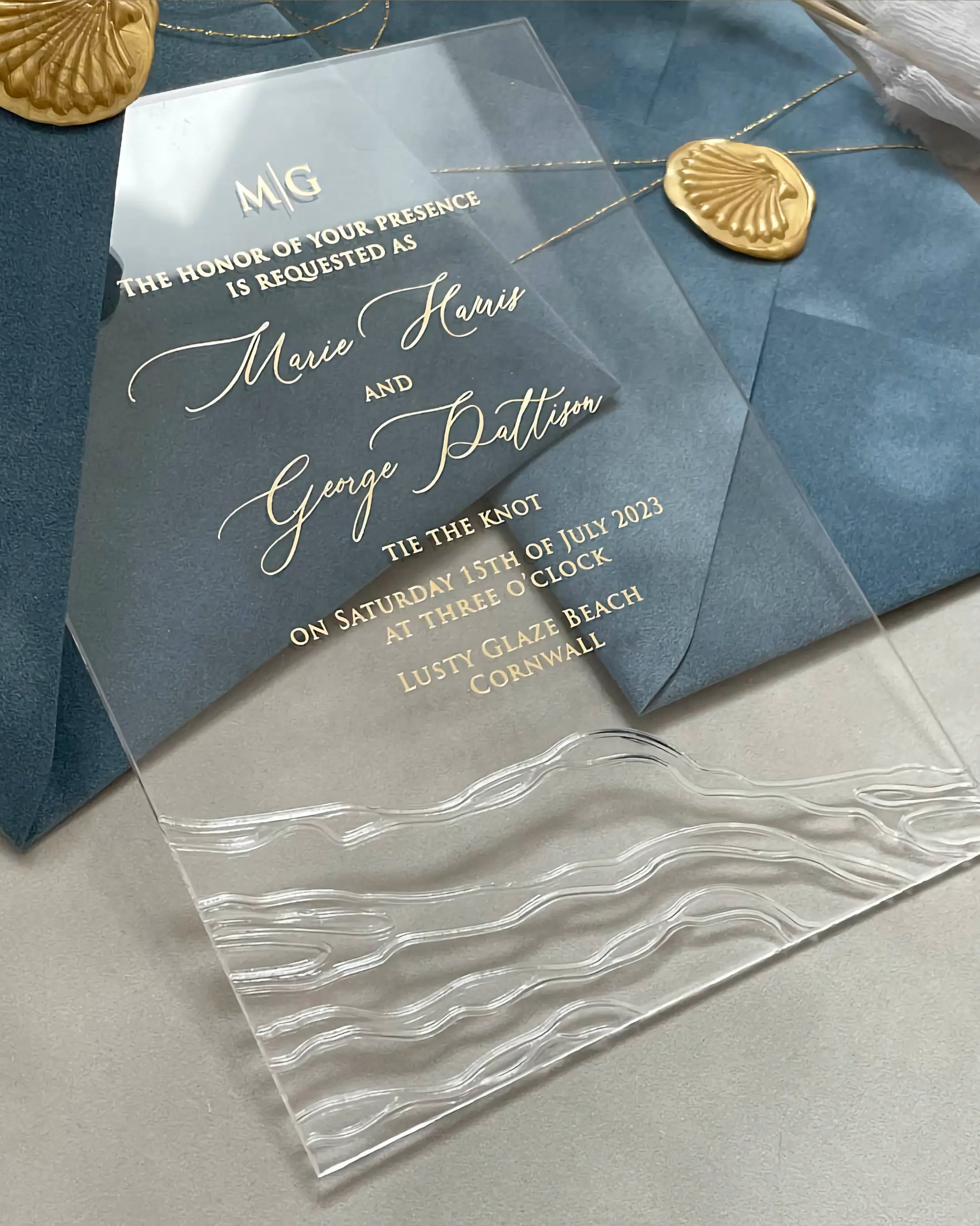 Seawaves Acrylic Wedding Invitation with gold foil monogram on Dusty Blue velvet envelope and gold shell seal — Polina Perri