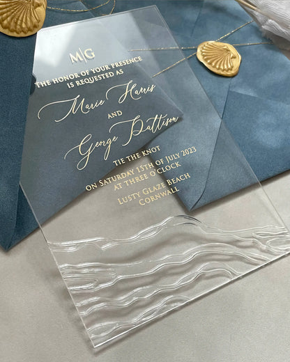 Seawaves Acrylic Wedding Invitation with gold foil monogram on Dusty Blue velvet envelope and gold shell seal — Polina Perri