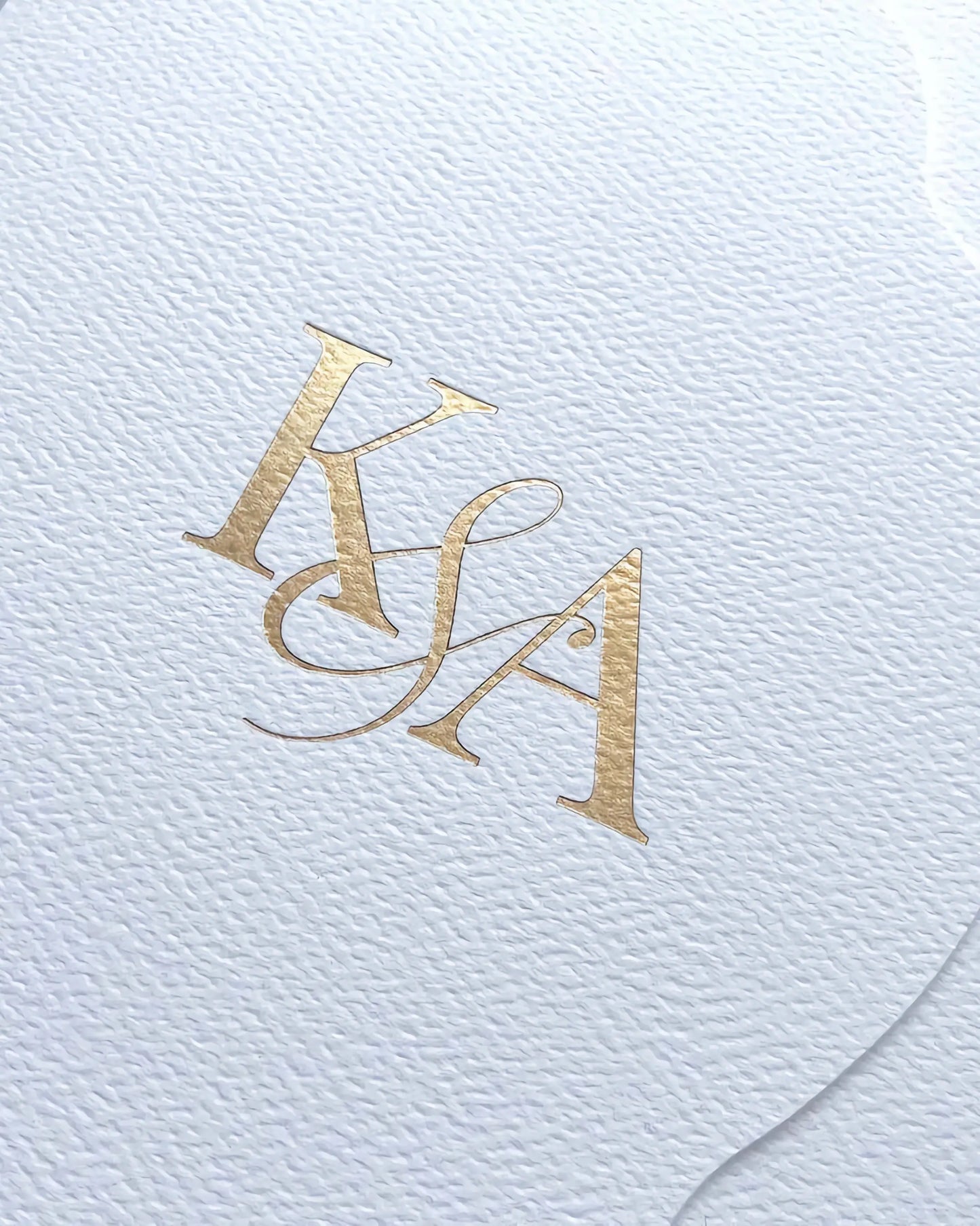 White Vertical Pocketfold cover with gold foil stamped monogram close-up — Polina Perri