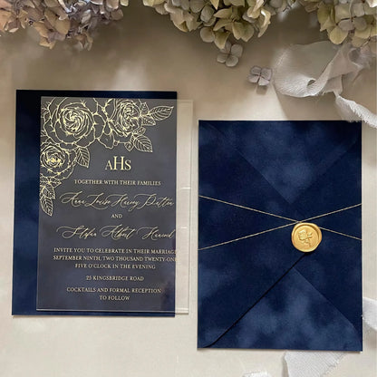 Gold Roses Acrylic wedding invitation with gold foil roses and Navy Blue velvet envelope with gold wax seal styled flat lay — Polina Perri