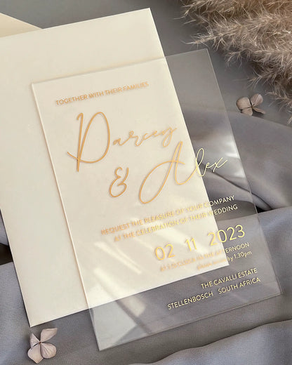 Modern Chic Acrylic wedding invitation with gold foil script on clear acrylic and cream envelope — Polina Perri