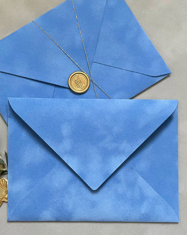 Amalfi velvet envelopes with gold wax seal and gold string close-up — Polina Perri