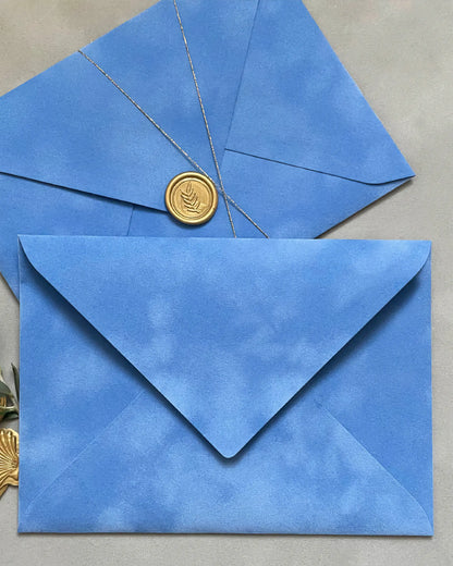 Amalfi velvet envelopes with gold wax seal and gold string close-up — Polina Perri