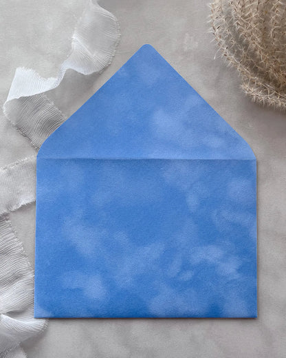 Amalfi velvet envelope flat lay close-up — Polina Perri