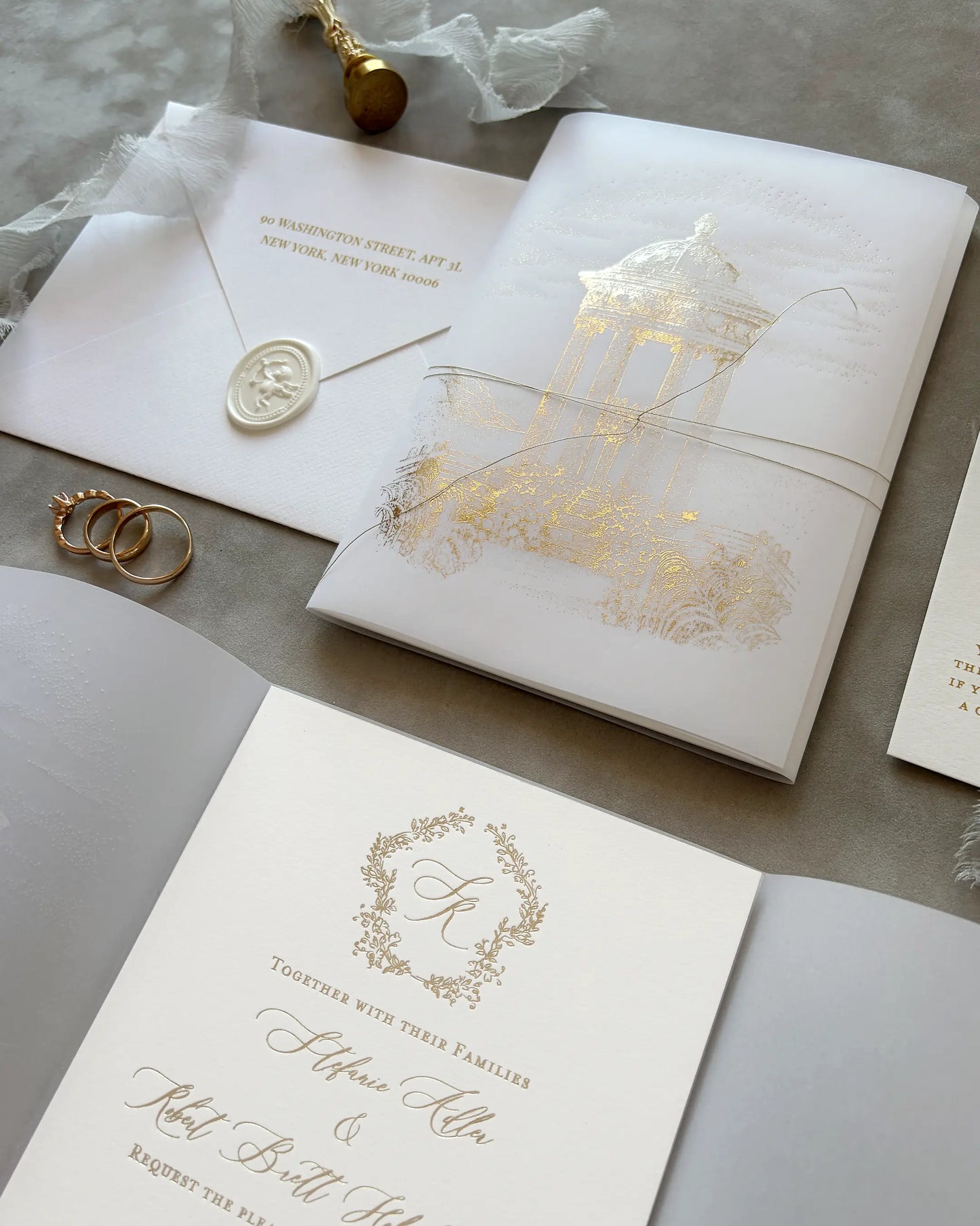 Belvedere luxury destination wedding invitations elegant suite showcasing gold foil vellum wrap luxury cotton cards and wax seal details Polina Perri