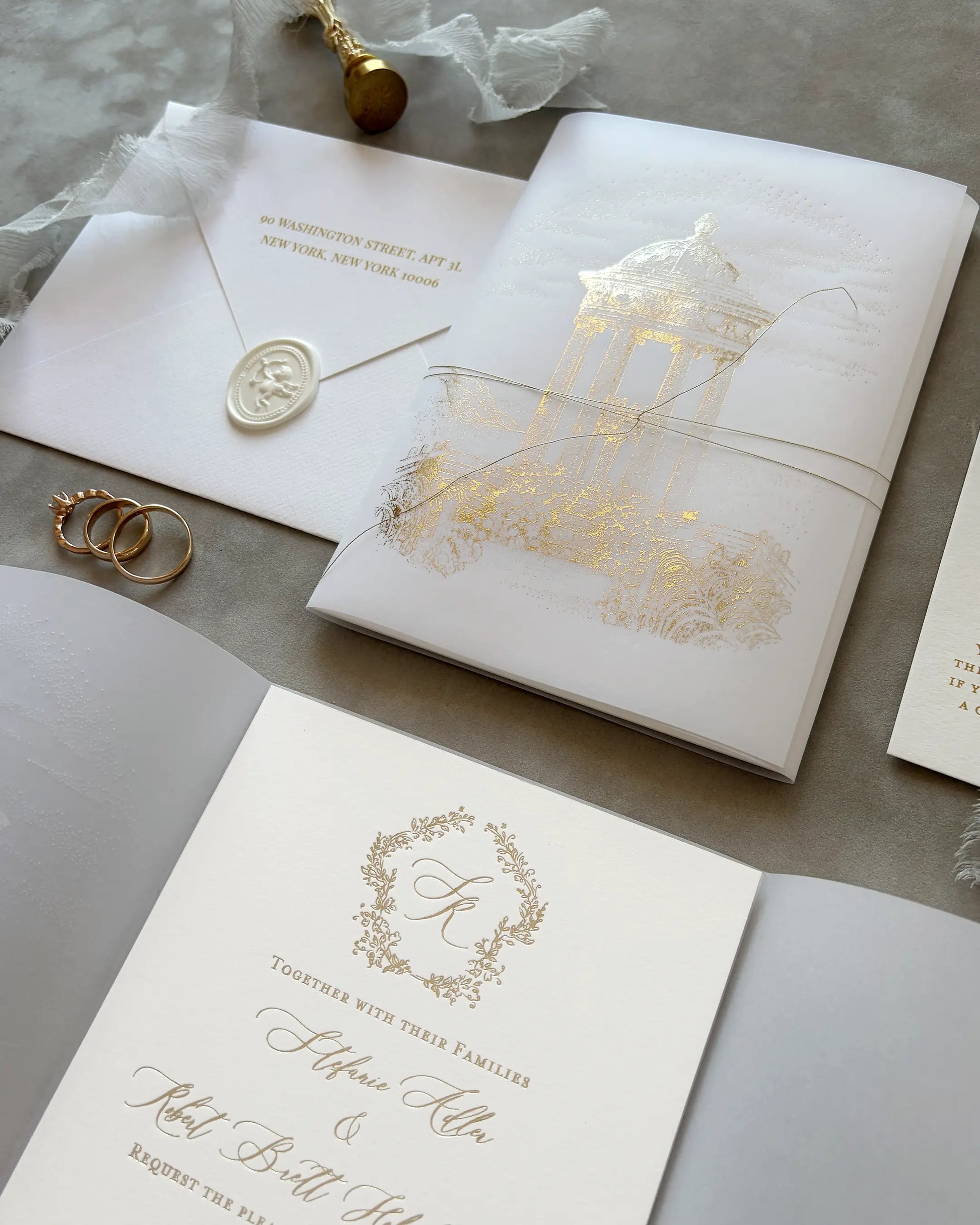 Belvedere luxury destination wedding invitations elegant suite showcasing gold foil vellum wrap luxury cotton cards and wax seal details Polina Perri