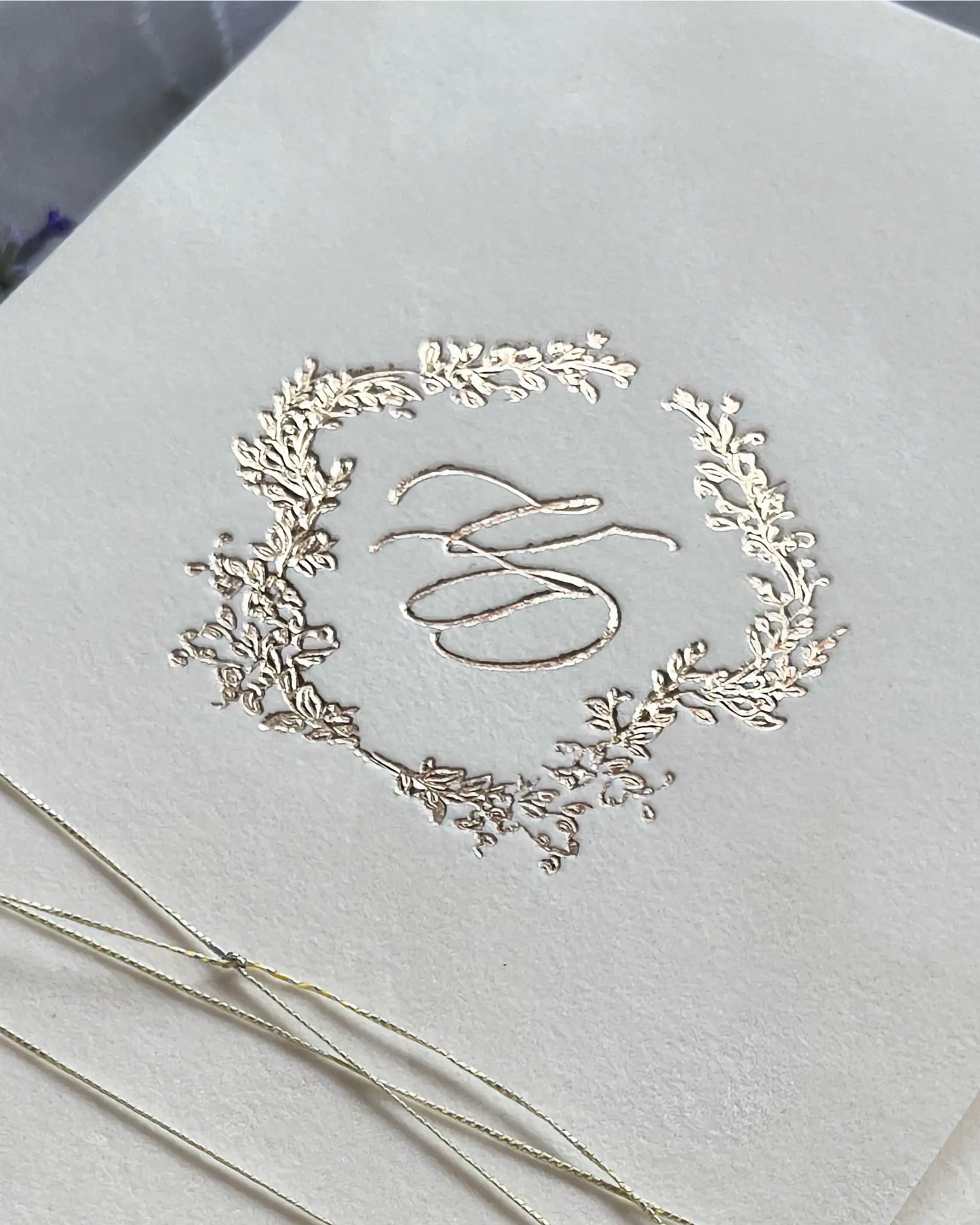 Virginie Cream velvet pocketfold cover with rose gold foil monogram wreath close-up — Polina Perri
