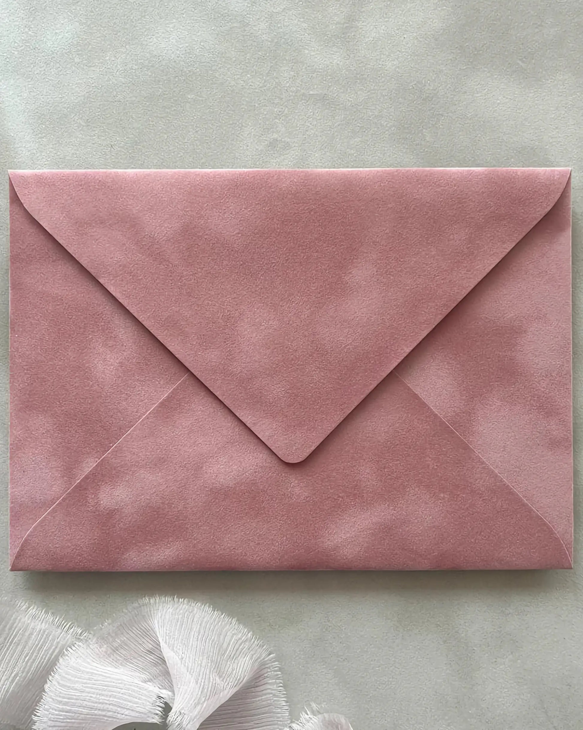 Dusty Pink velvet envelope flat lay close-up — Polina Perri