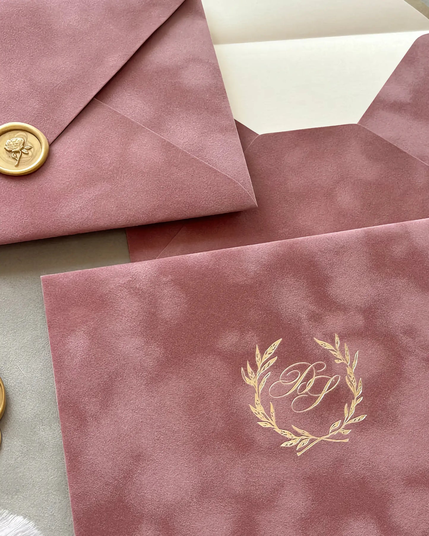  Dusty Pink velvet envelopes with gold wax seal and foil monogram wreath close-up — Polina Perri