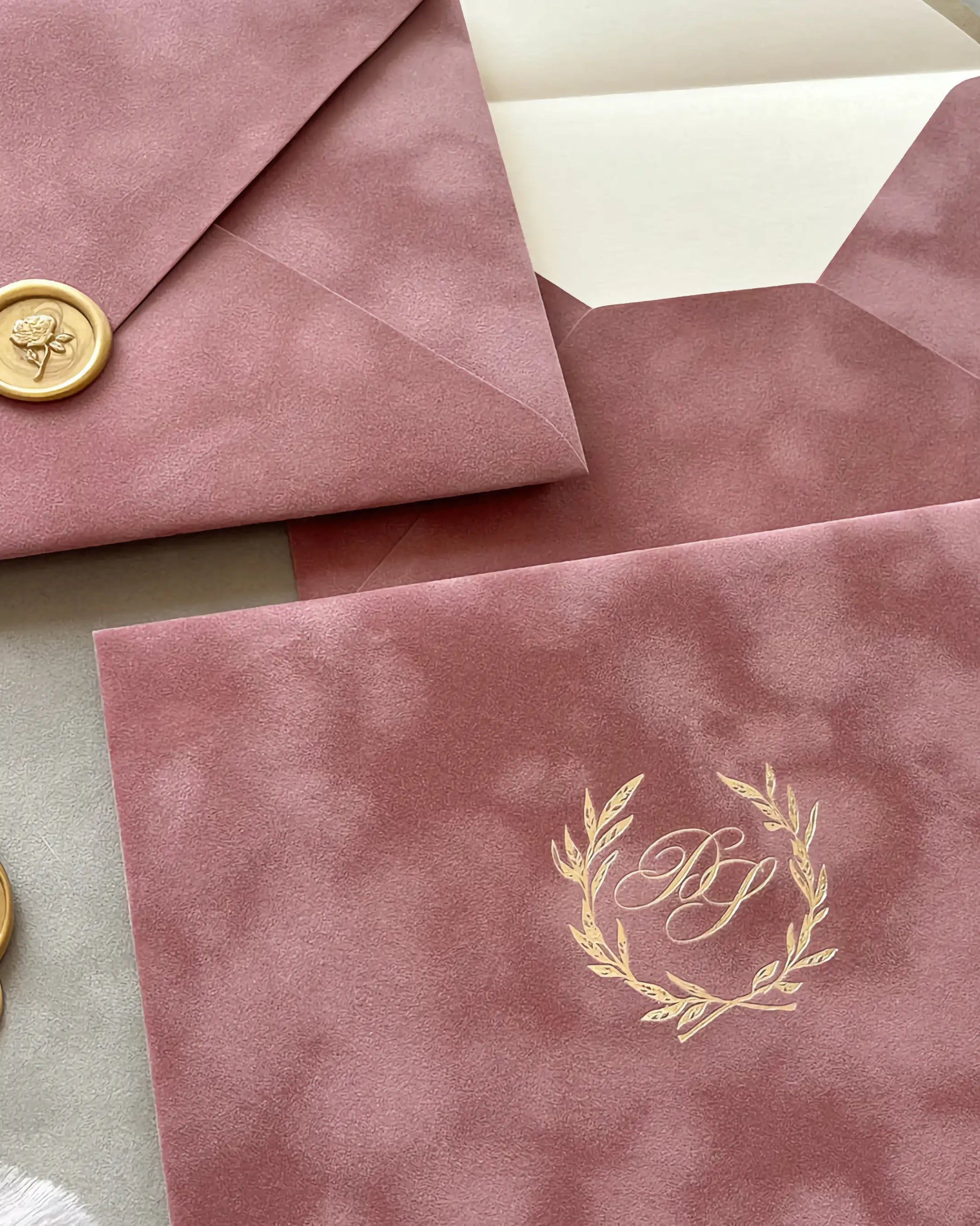 Dusty Pink velvet envelopes with gold wax seal and foil monogram wreath close-up — Polina Perri