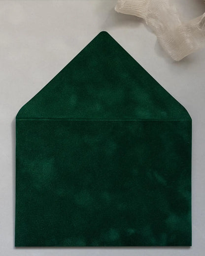 Forest Green velvet envelope flat lay close-up — Polina Perri