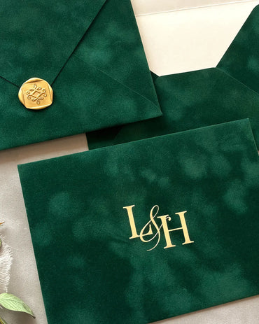 Forest Green velvet envelopes with gold wax seal and foil monogram close-up — Polina Perri
