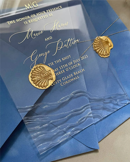 Seawaves Acrylic Wedding Invitation with gold foil wording on Amalfi blue envelope and gold shell wax seals — Polina Perri