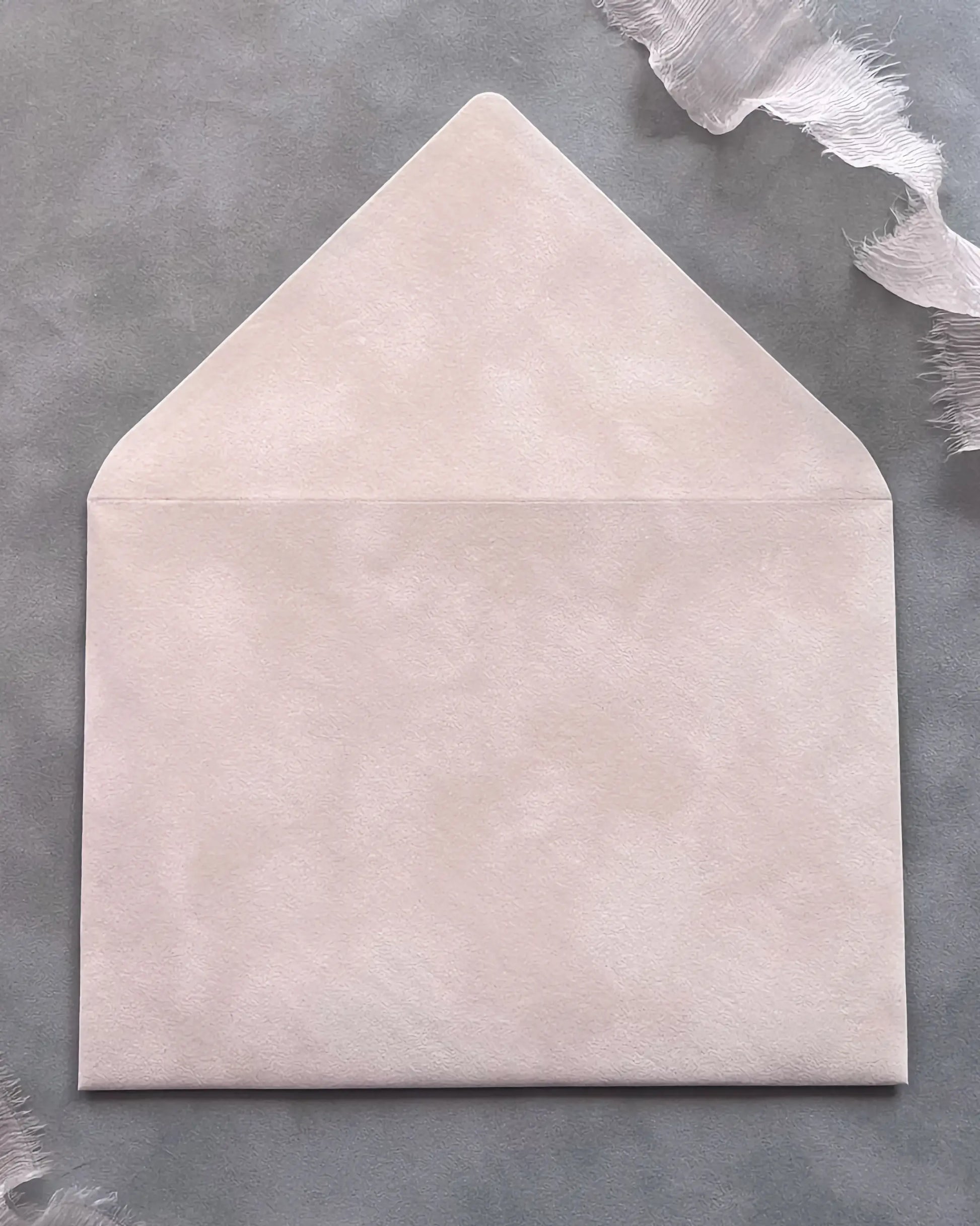 Blush Velvet Paper Wedding Envelope open showing soft texture and cream shimmer liner — Polina Perri