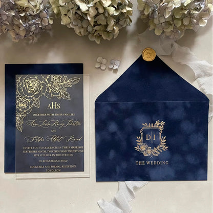 Gold Roses Acrylic wedding invitation and Navy Blue velvet envelope with gold monogram crest flat lay — Polina Perri