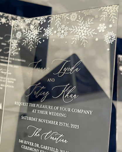 Winter Wonderland Silver Acrylic clear acrylic wedding invitation close-up with silver snowflake border — Polina Perri