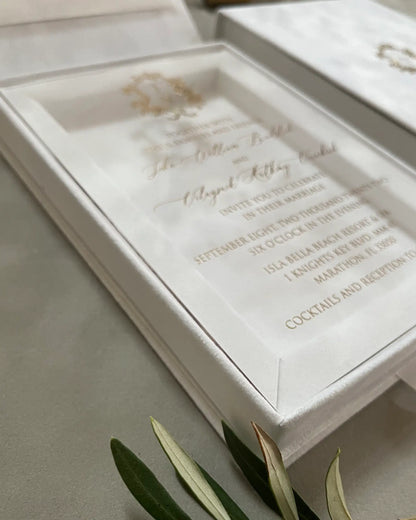 White Velvet Boxed Hampton Manor wedding invitation by Polina Perri, close up side angle of clear acrylic invitation card nestled inside premium white velvet boxed holder