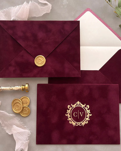Burgundy velvet envelope with gold wax seal and foil monogram, cream paper lining — Polina Perri