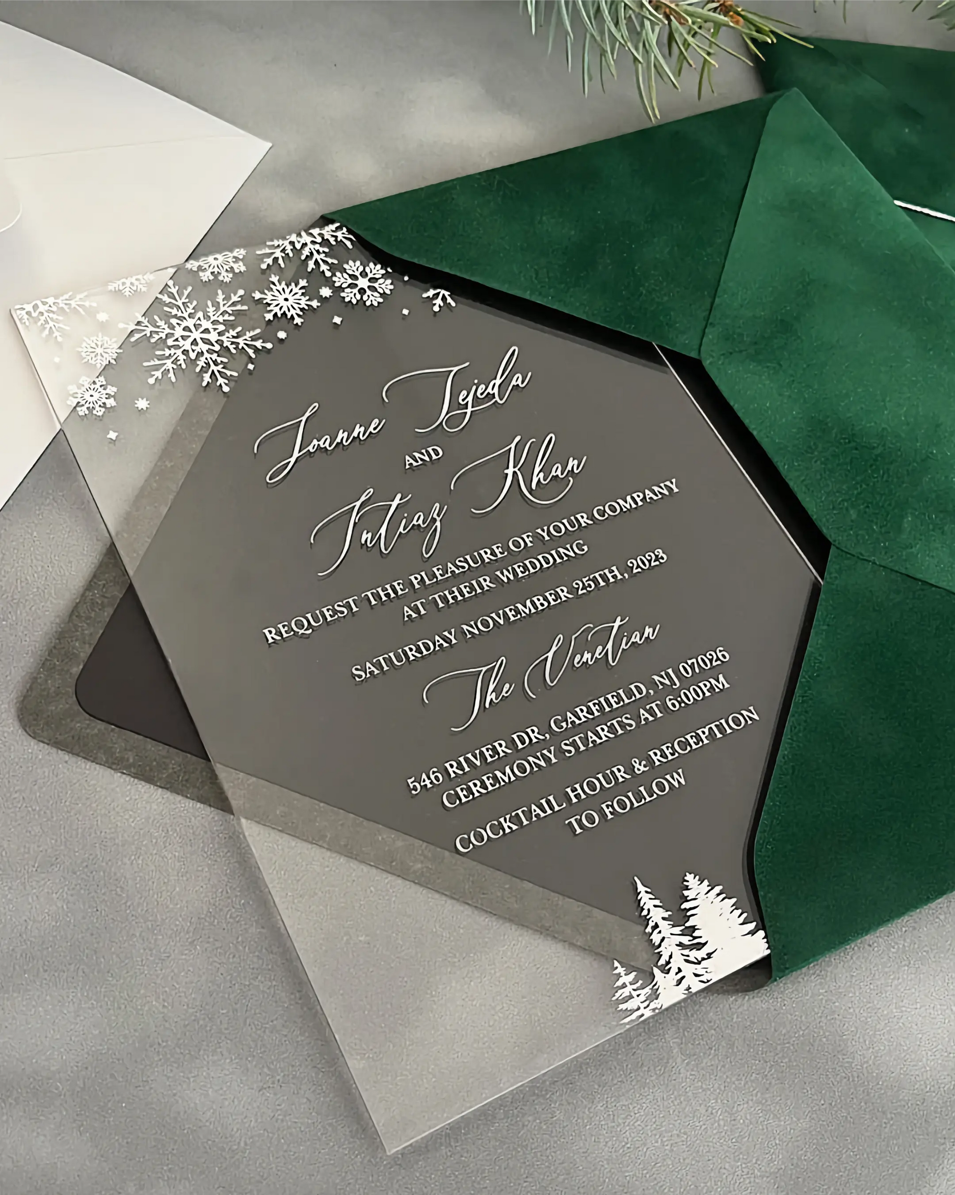 Winter Wonderland Silver Acrylic wedding invitation with silver snowflake design and Forest Green velvet envelope — Polina Perri
