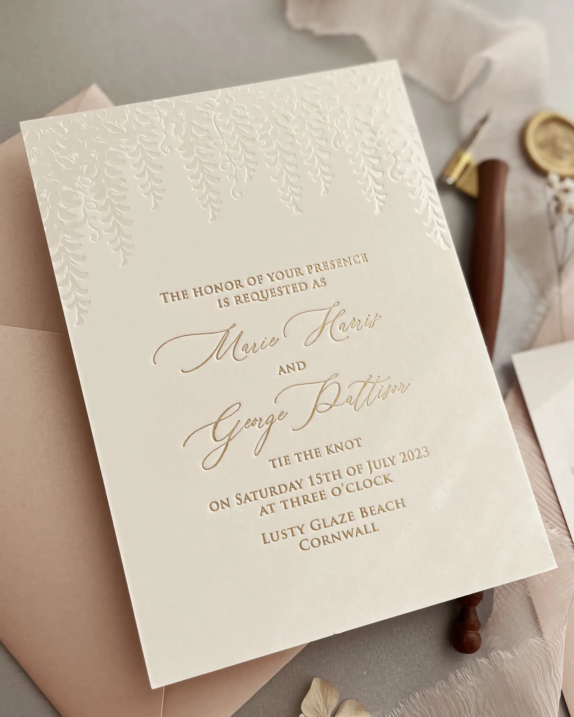 Embossed Wisteria Wedding Invitation Detail — Pearl Foil and Gold Calligraphy — Polina Perri